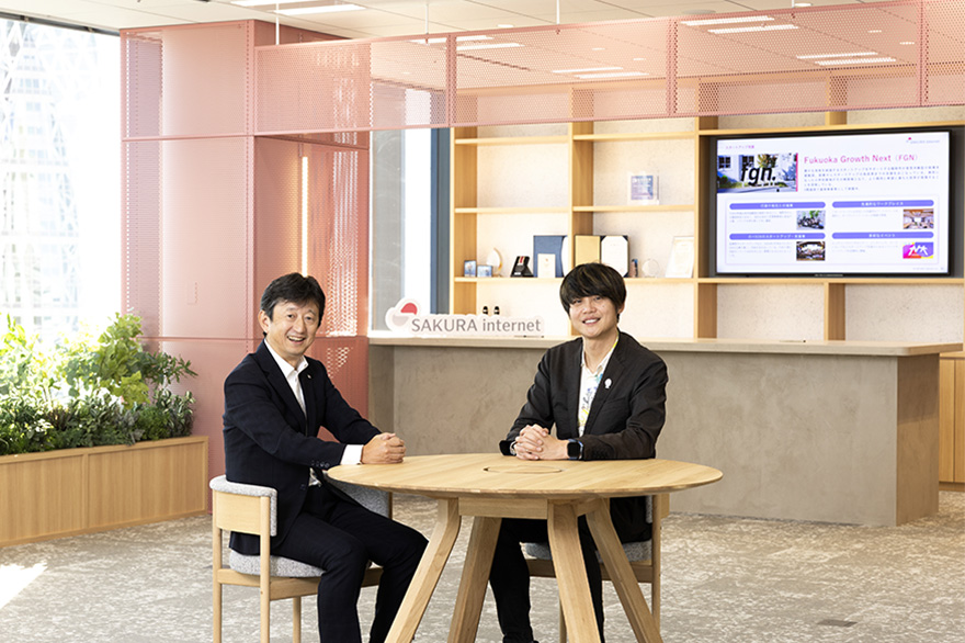 写真：さくらインターネット株式会社 代表取締役社長 田中 邦裕 様、キヤノンITソリューションズ株式会社 上席執行役員 山岸 弘幸