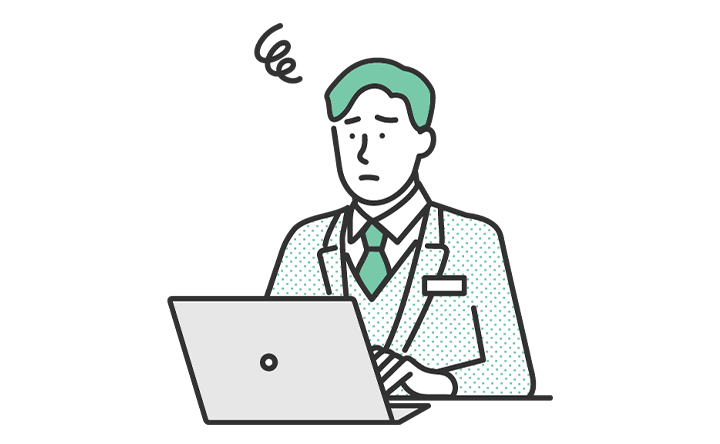画像：PCの前で困った表情をする男性のイラスト